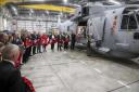Wreaths were airlifted to Plymouth to be loaded onto the train to London for the service on Sunday