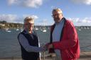 Nigel Sharp, Chairman of the Port of Falmouth Sailing Association presented retired Falmouth Harbour Master, Duncan Paul with a glass plaque to acknowledge the close relationship between the two organisations