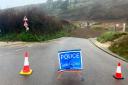 The road at Poldhu beach in Cornwall has flooded again following heavy rainfall