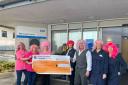 A cheque was presented to The Mermaid Centre from last year's Pink Wig event