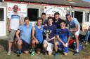 Have I got Poos For Yoy celebrate winning the tournament with Mark Greet, Ben's son (top left)
