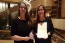 Bethany and Emily at the Gala Dinner receiving certificate of attendance at the 10th ISYF at Hwa Chong Institution, Singapore