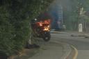 The motorbike on fire near Melvill Road. Credit: Danny Frost