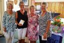 Left to right: Kath Kelly, Lyn Innes, Falmouth Lady Captain Rachael Curnow presenting the prizes and Alison Gessey from West Cornwall