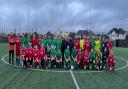 The teams in the Parents versus Coaches match at Falmouth Youth Community Football Club