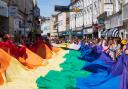 The first Pride march of the month, kicking off in Falmouth with the world's largest Pride march flag. The march started at the Prince of Wales Pier, went through the centre of town and ended at Events Square. 7th May 2022. Picture Ollietphotography