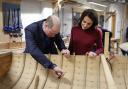 The Duke and Duchess of Cornwall while in Cornwall, help refurbish a boat in the boat building workshop