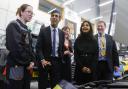 The PM and party talk engines with a motor vehicle student