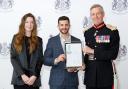 Lord-Lieutenant of Cornwall, Colonel Edward Bolitho presents the award to Take Point Training CEO Nick Pinniger & Head of Operations Izzy Galloway