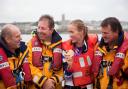 Helen with Penlee Lifeboat volunteers shortly after winning gold at the Olympics