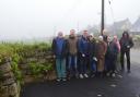Residents at the entrance to Viva Treverva on a misty day