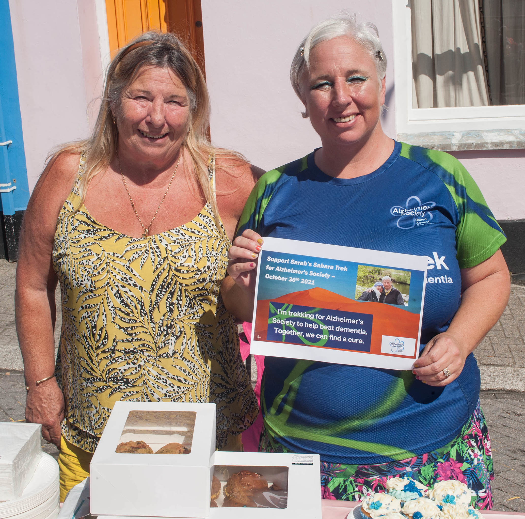 Teri Ann Pellow (left) and Sarah King on the Alzheimers Society stall. Sarah from Mylor Bridge, is looking to raise money for the Alzheimers Society by walking across the Sahara Desert in a tribute to her dad who has early on-set Alzheimers. Picture by