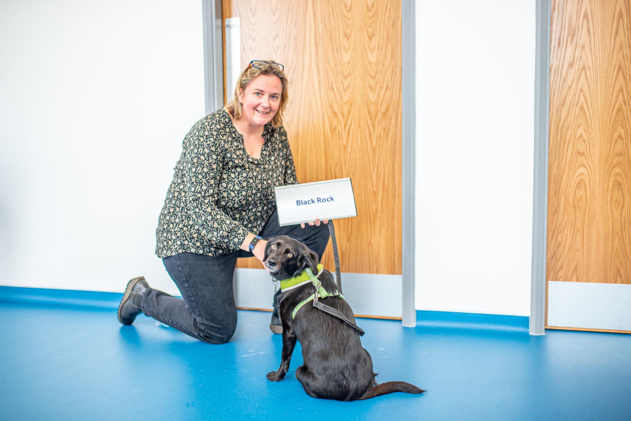 Lisa Plummer, with dog Hobbit, won a competition to name all the consult rooms, after Cornish beaches