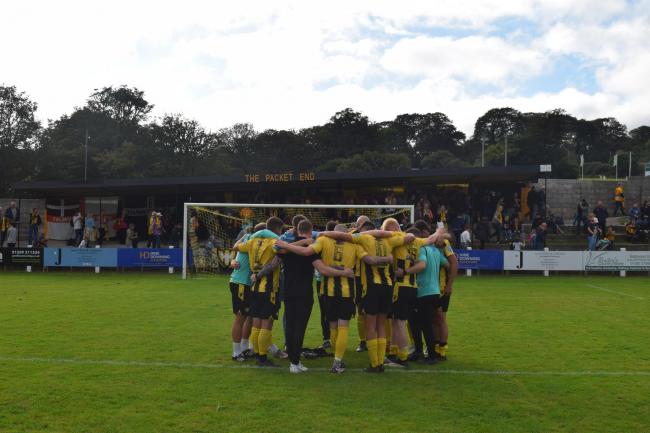Falmouth Town pictured in front of the Packet End