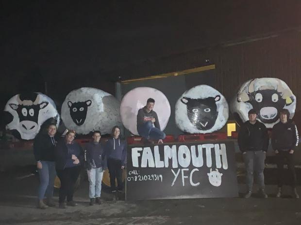 Falmouth Packet: The group unveil their models. Picture: FalmouthYFC