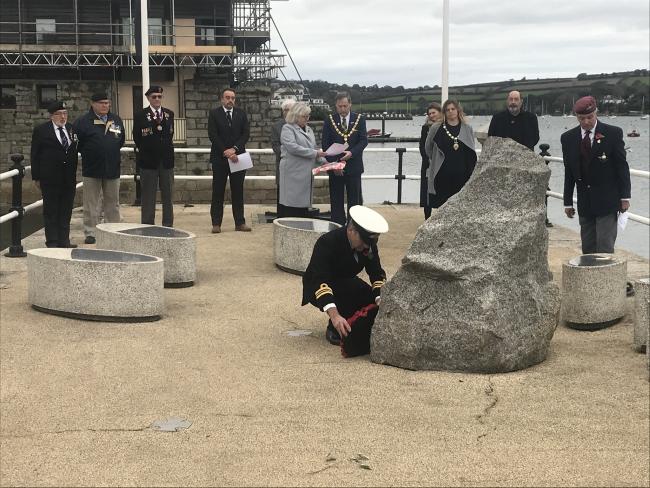 In Falmouth, a two minute silence was observed, with residents and town officials meeting at the St Nazaire Memorial on the Prince of Wales Pier. Picture: Bobby Angelove
