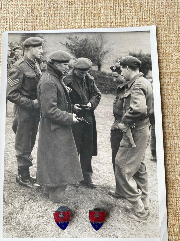 Falmouth Packet: Ken's father on the far right with Ken having his pistol inspected.