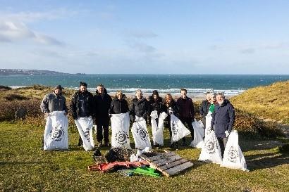 Falmouth Packet: Away Resorts St Ives Beach Resort staff and managers with Surfers Against Sewage.
