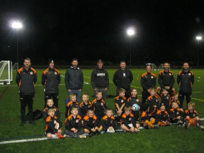 A kids football team in in Cornwall have had their spirits raised after netting bran new training kits from their sponsors.
