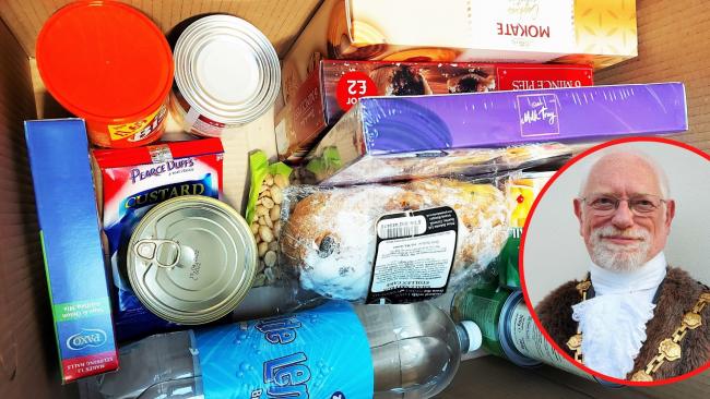 Penzance mayor Jonathan How (inset) has donated 50 Christmas food boxes