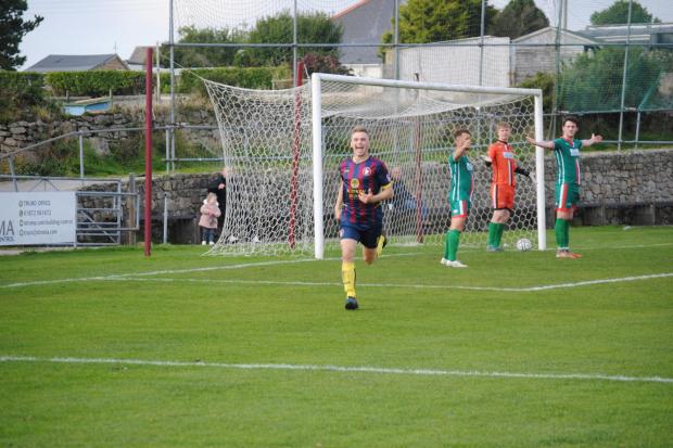 Cam Wheat scored the winner as Wendron ascended to third in the league