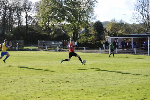 Falmouth Packet: Striker Ryan Reeve bares down on goal for Penryn