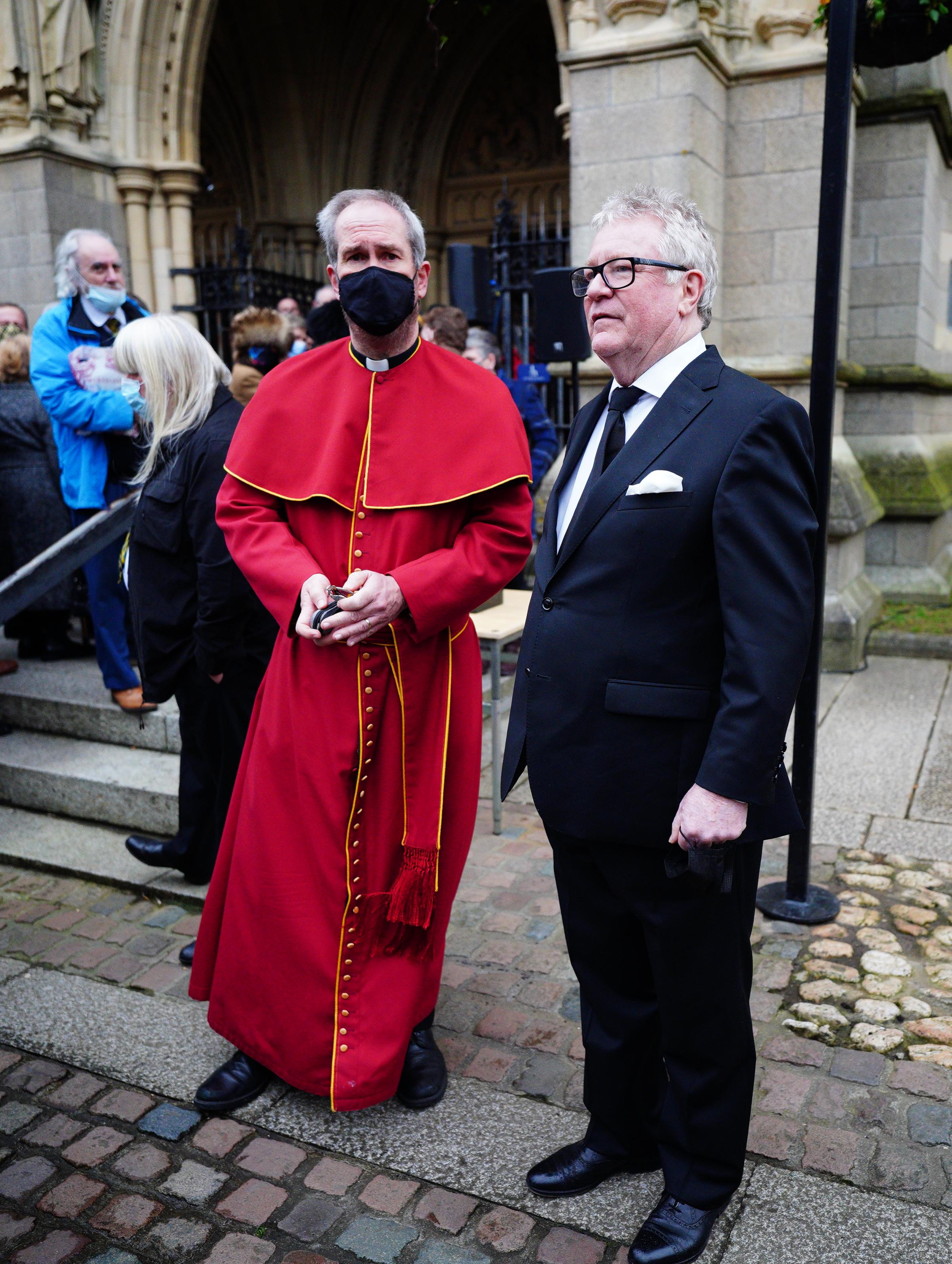 Jim Davidson (right) with Reverend Canon Alan Bashforth ahead of the funeral of Cornish comedian Jethro at Truro Cathedral in Cornwall. Jethro, real name Geoffrey Rowe, died on December 14 after contracting Covid-19. Picture date: Monday January 3, 2022.