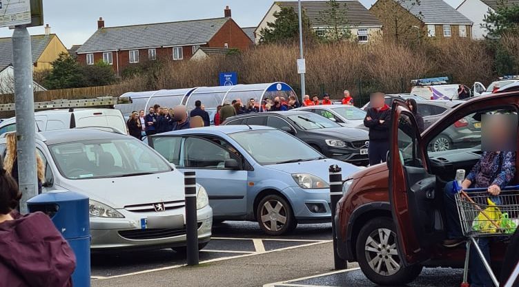 Staff and customers had to wait in the car park for the store to reopen