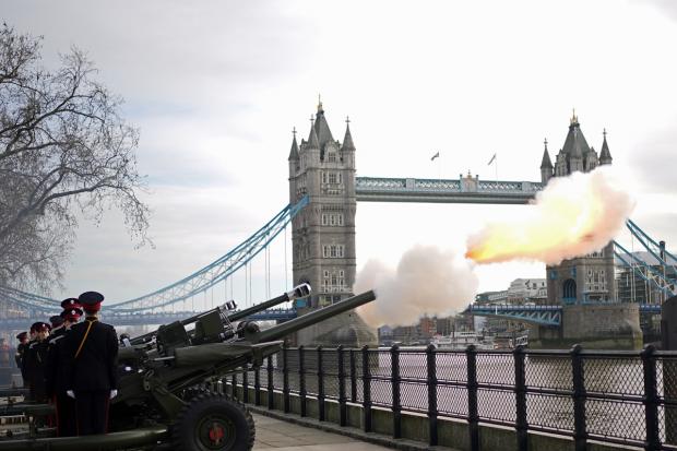 Falmouth Packet: Members of the Honourable Artillery Company fire a gun salute from the wharf at the Tower of London to mark the official start of the Platinum Jubilee. Picture: PA