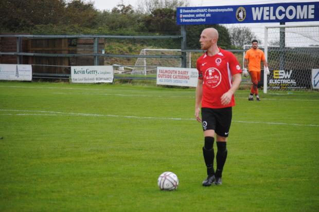 Russell May pictured against Wendron United, will remain as captain for the 2022/23 campaign