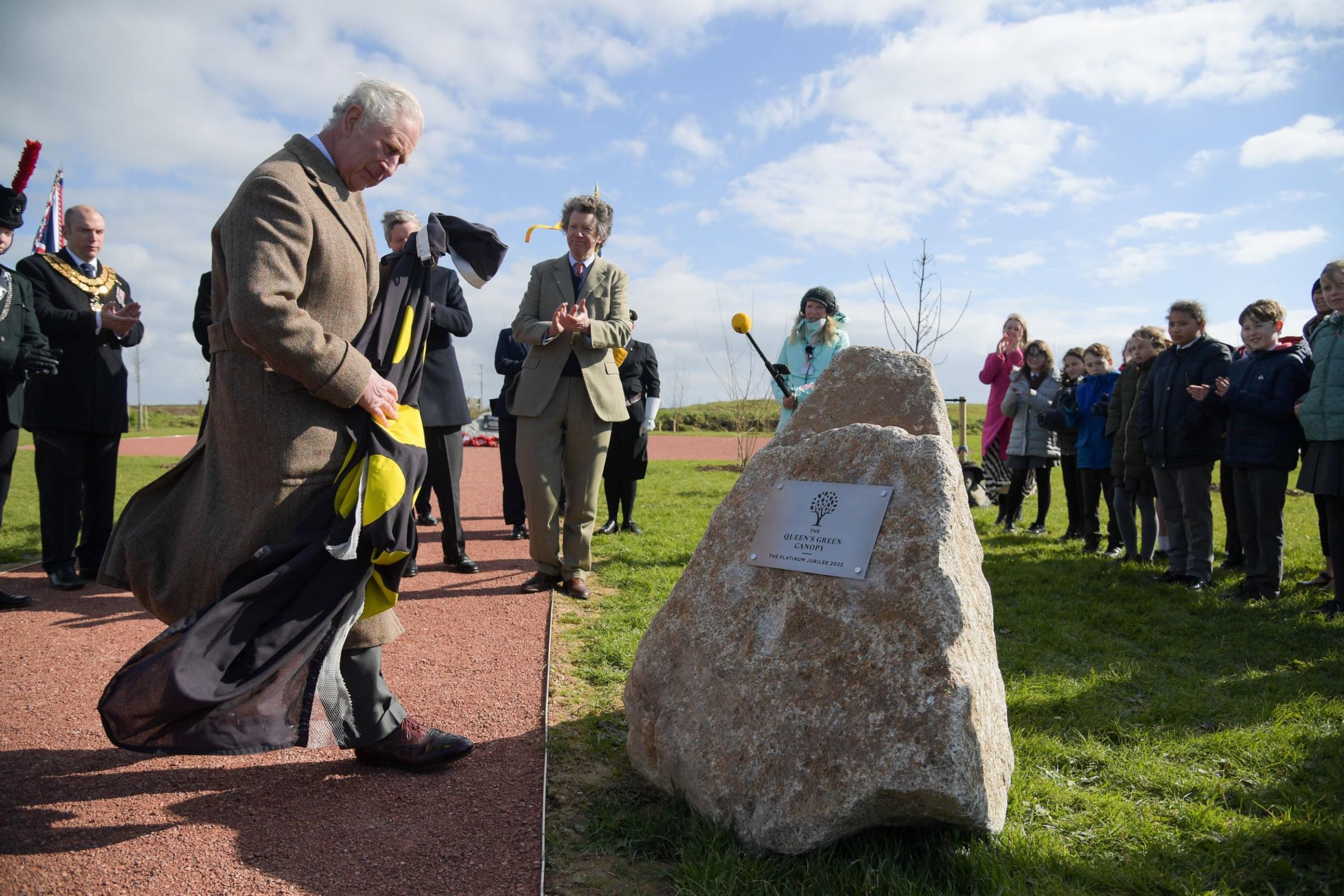 The Prince of Wales, who is also known as the Duke of Cornwall unveils The Queens Green Canopy Platinum Jubilee 2022 plaque during a visit to the recently planted Royal British Legion Centenary Picture: PA Wire