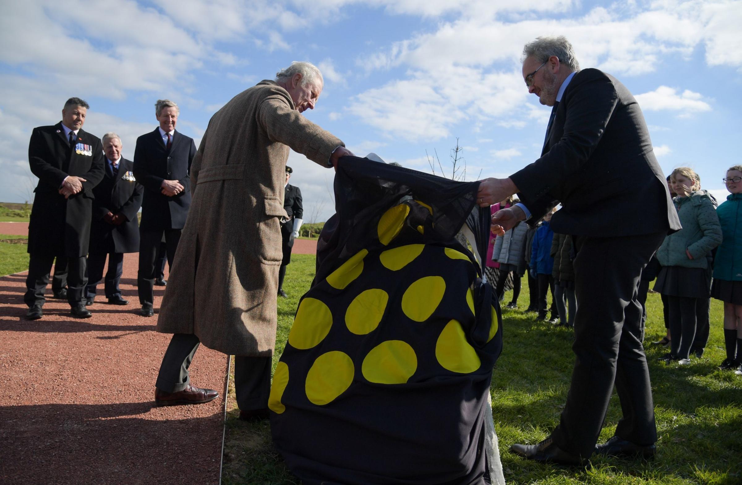 The Duke of Cornwall (left) unveils The Queens Green Canopy Platinum Jubilee 2022 plaque Picture: PA Wire