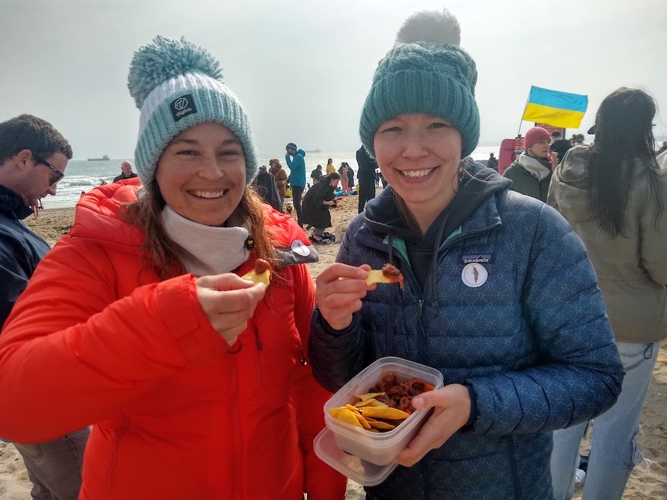 Rachel Nicholls-Lee and Celia Hawthorn enjoy some chilli after taking part in the Gylly Chilli Swim for Ukraine