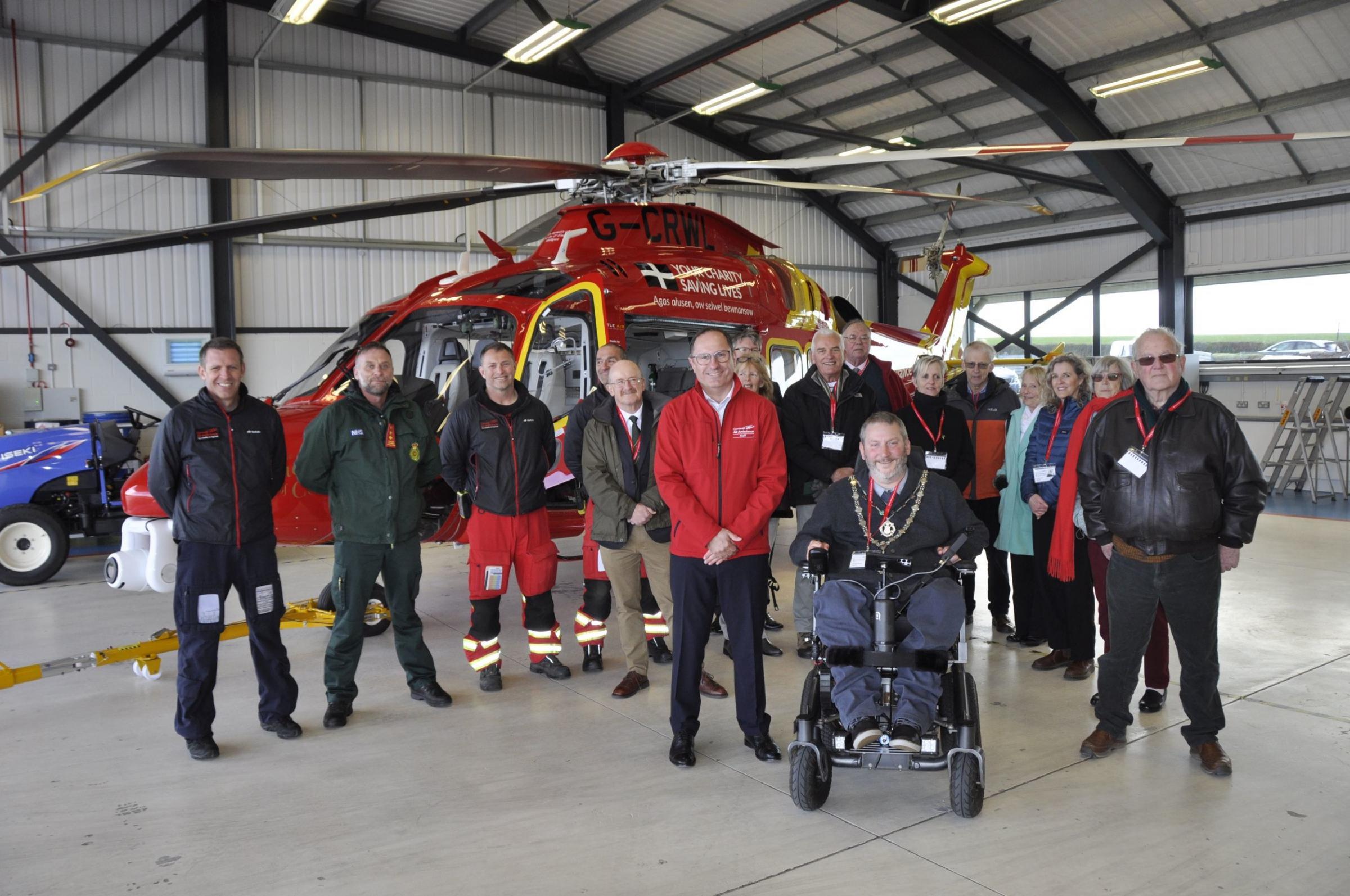 Truro mayor Steve Webb joins the Cornwall Air Ambulance team and patients they have saved, to mark 35 years