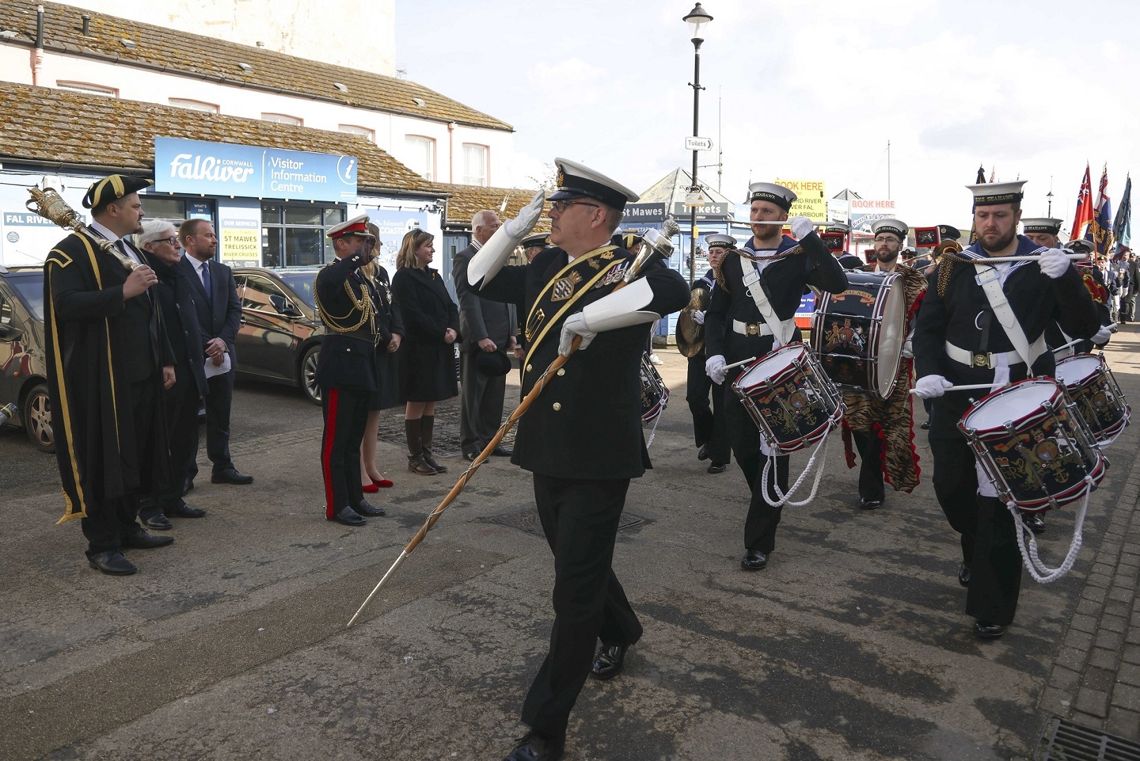 Pictured: HMS Seahawks volunteer band march past VIPs and dignitaries during the 80th memorial service marking the St Nazaire Raid. Credit: LPhot Dan Rosenbaum, RNAS Yeovilton