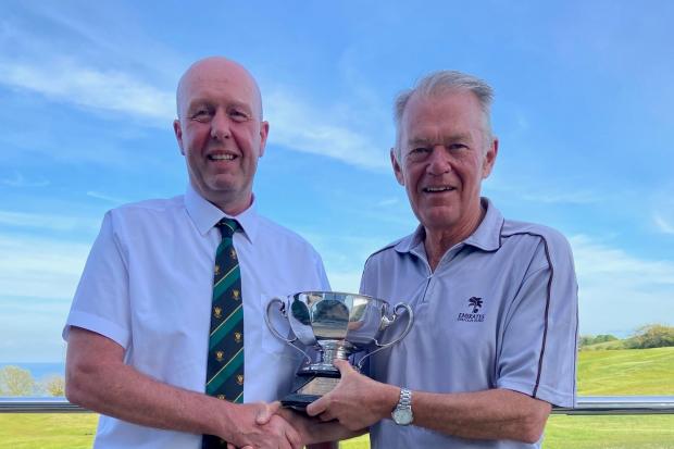 Club Captain Nick Chinn (left) presenting David “Dickie” Dickinson with the Falmouth Hotel Bowl