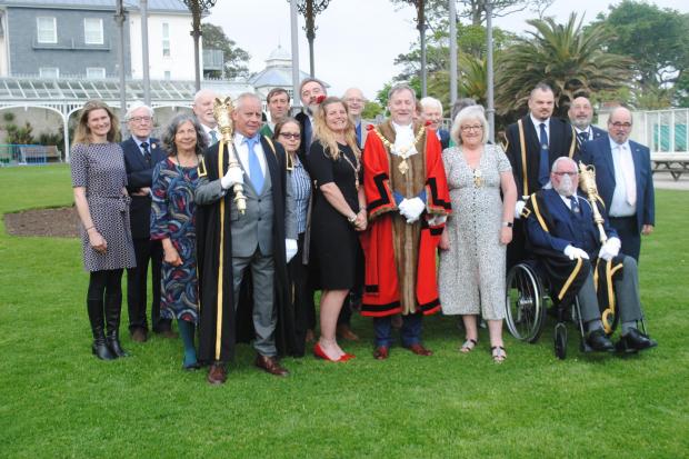 The council lined up in the garden after mayor making
