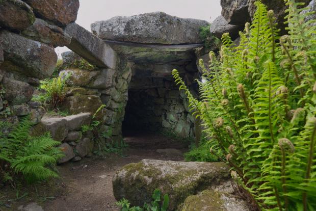 Falmouth Packet: The site's mysterious fogou, the original purpose of which is unknown. Picture: Gavin Parsons/English Heritage