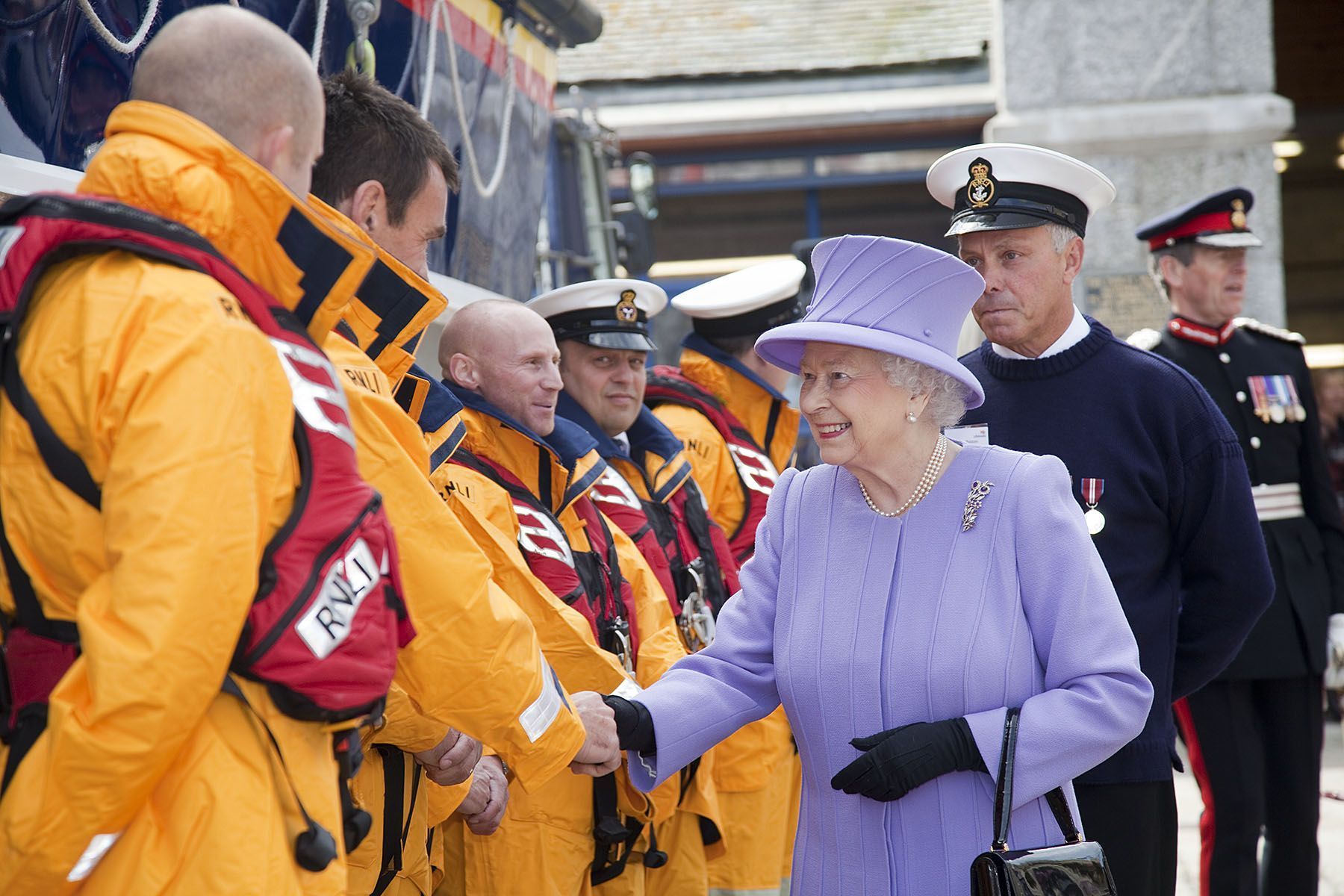 St Ives coxswain Paul Whiston (right) introduces the crew to the Queen Picture: Phil Monckton