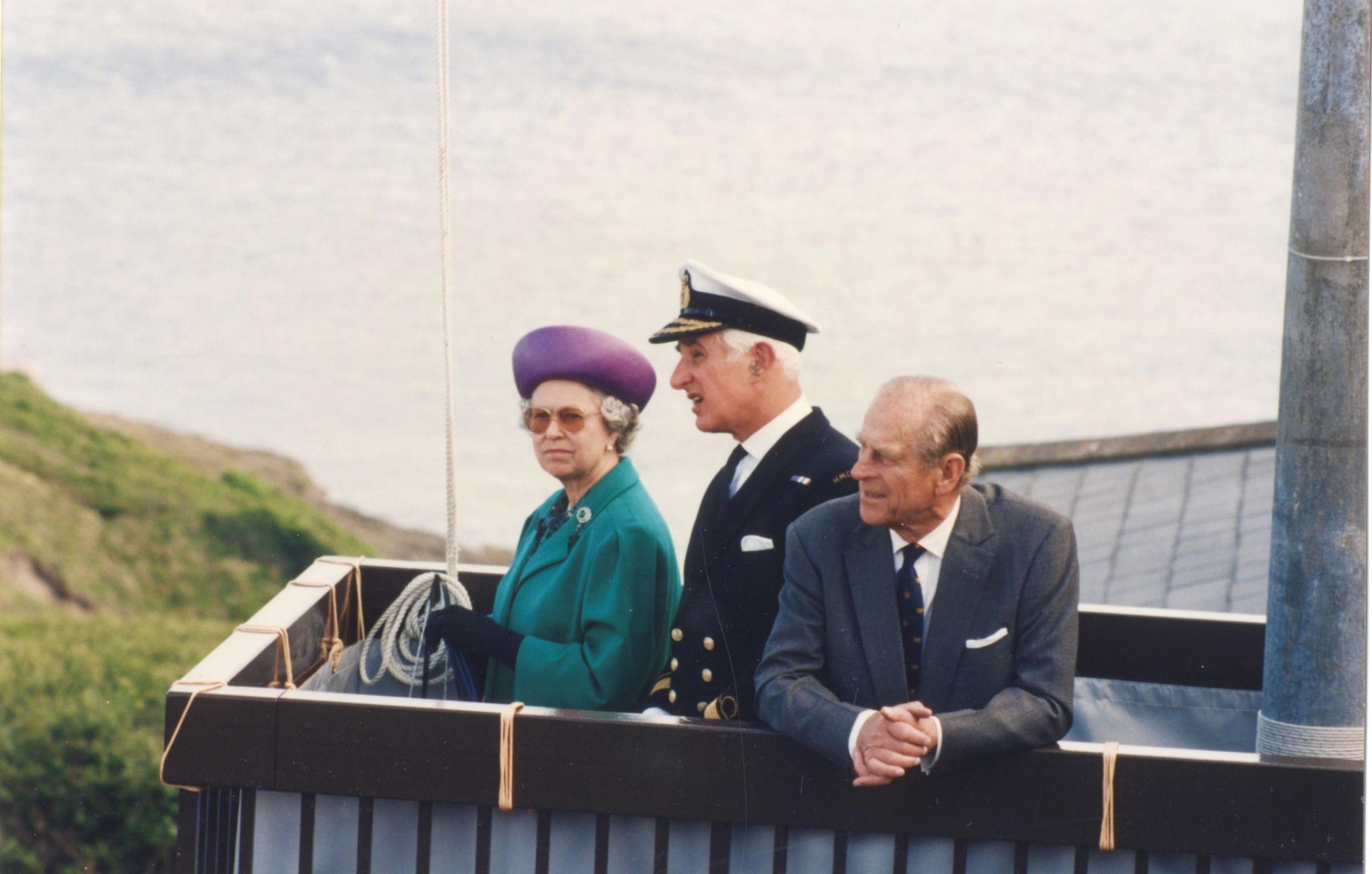The Queen and the Duke of Edinburgh look across Falmouth from the coastguard station in 1995 Picture: David Barnicoat Collection
