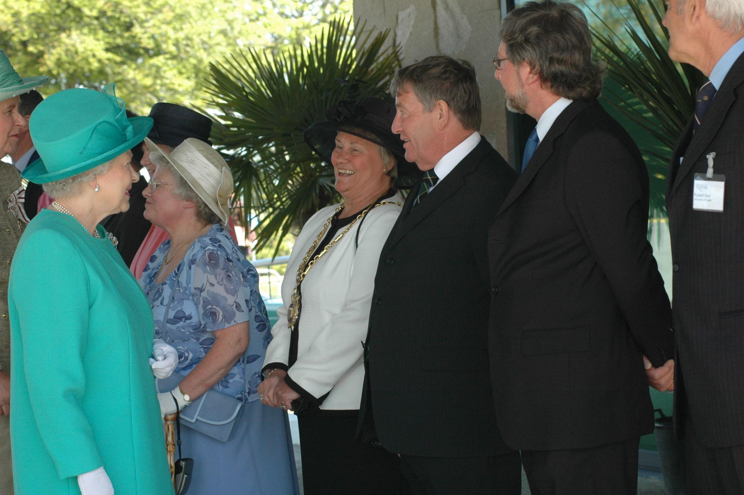 The Queen meets Penryn mayor Gill Grant, next to Falmouths Roger Bonney