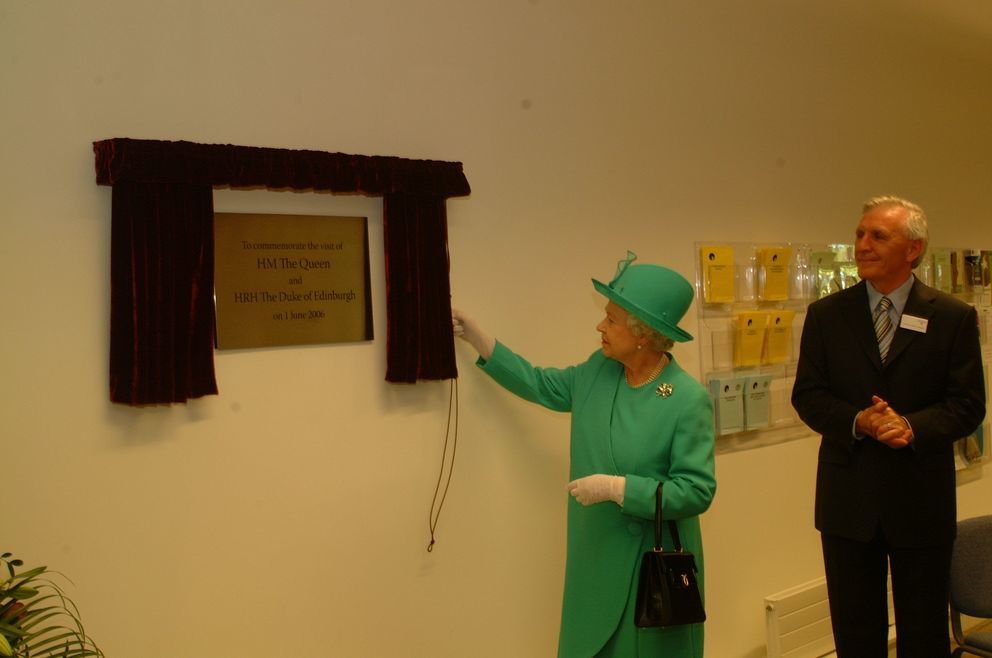 The Queen officially opens the Tremough university campus, watched by Professor Alan Livingston