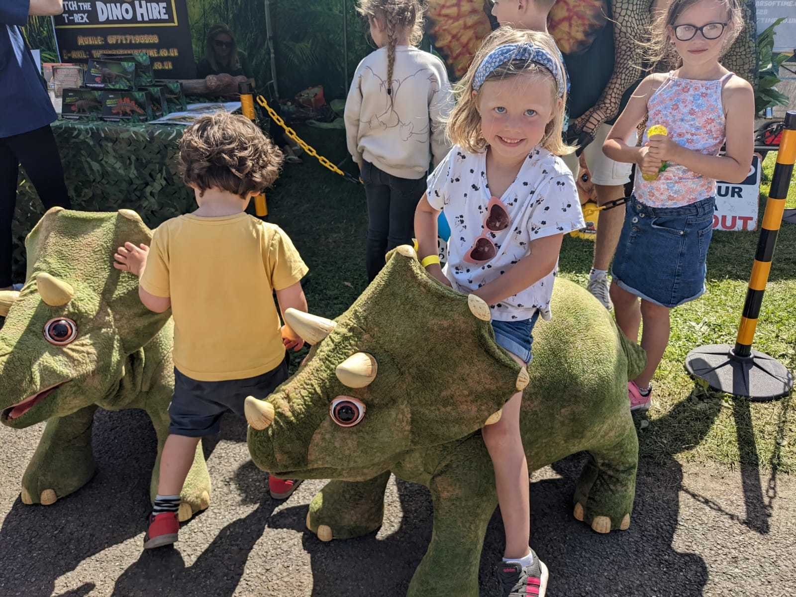 Lottie enjoying her time at the show on a T-Rex