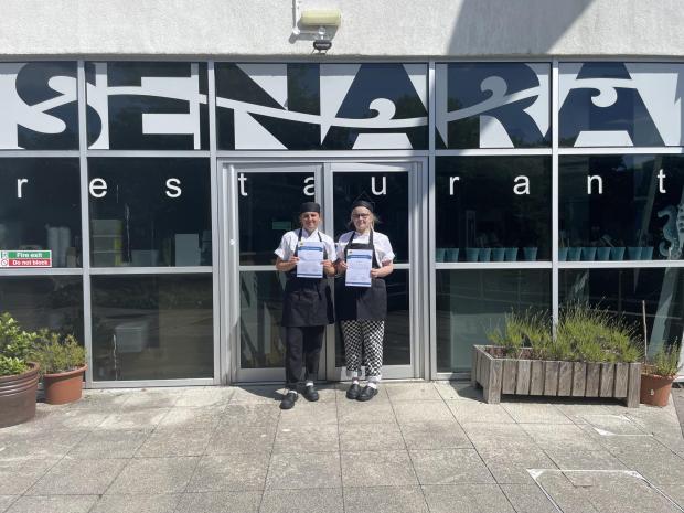 Falmouth Packet: Student chefs Emily (left) and Shay (right) with their attendance certificates outside Senara Restaurant at Penwith College