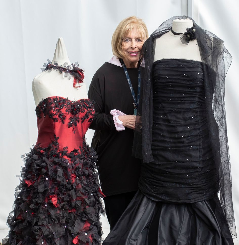 Notty Hornblower with two of the Ian Stuart dresses owned by Lady Katrina Holden.  Picture: Hansons