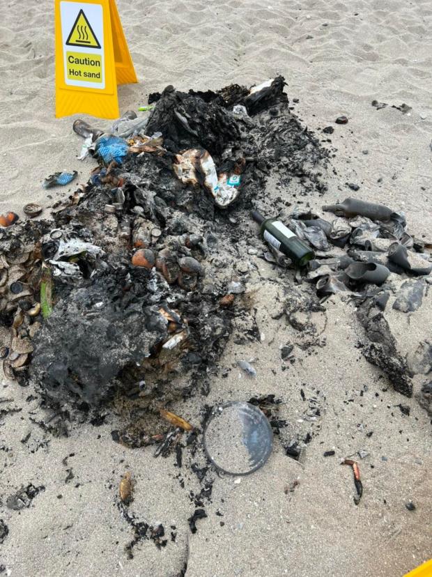 Falmouth Packet: The aftermath of the first blaze was cleared by a beach cleaner