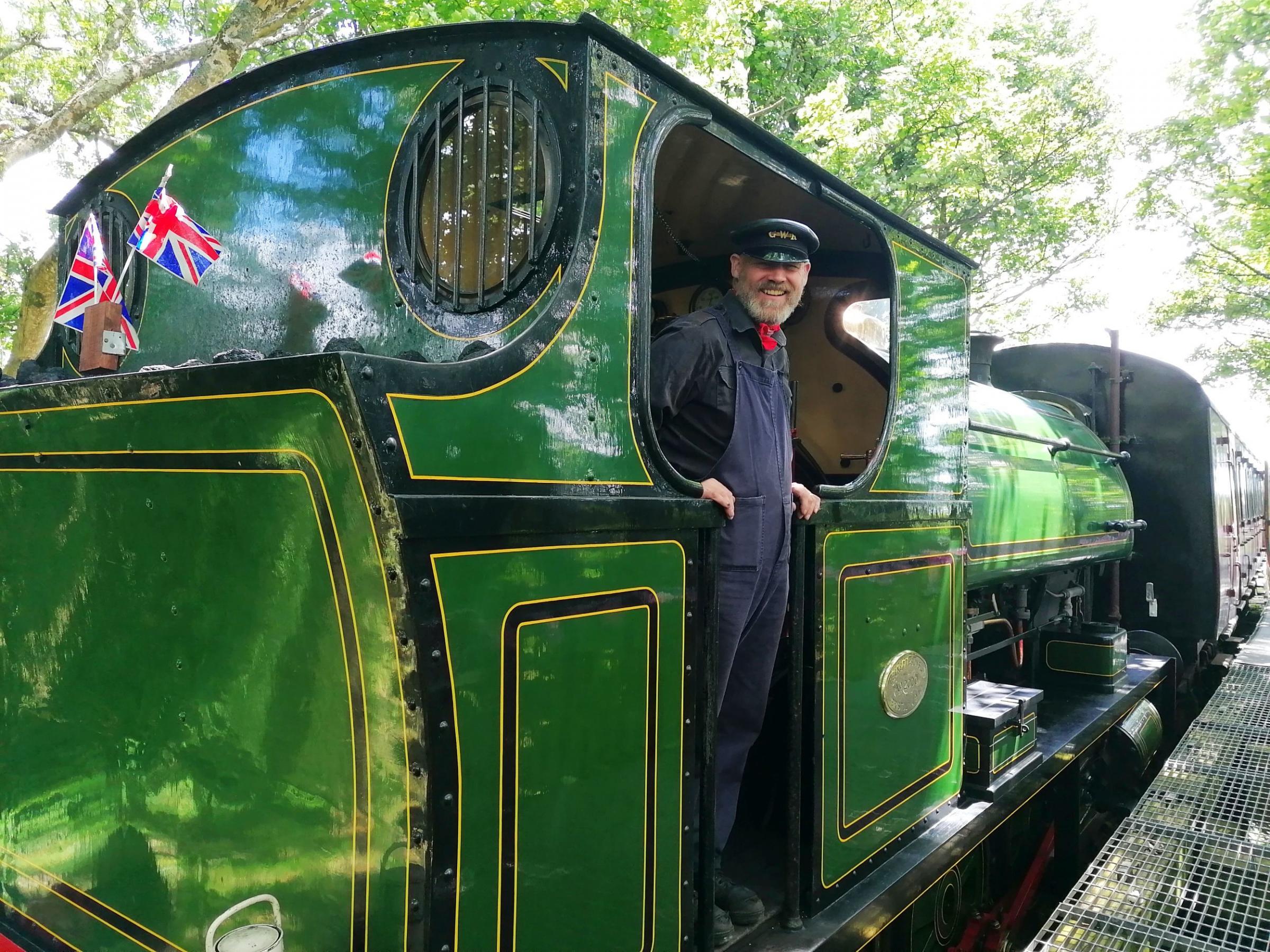 Marcus Laugher helps drive the trains