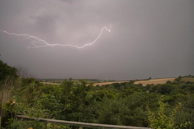 Falmouth Packet: Lightning near Helston on Tuesday morning Picture: Kathy White
