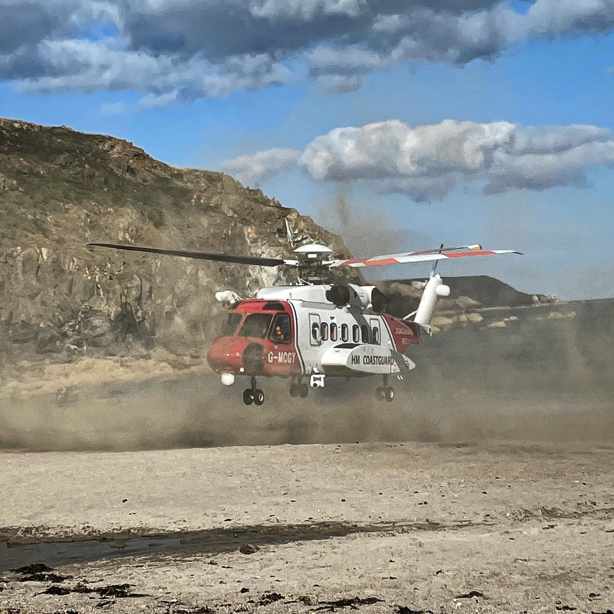 The coastguard rescue helicopter lands on the beach at Kennack  Picture: Mullion Coastguards