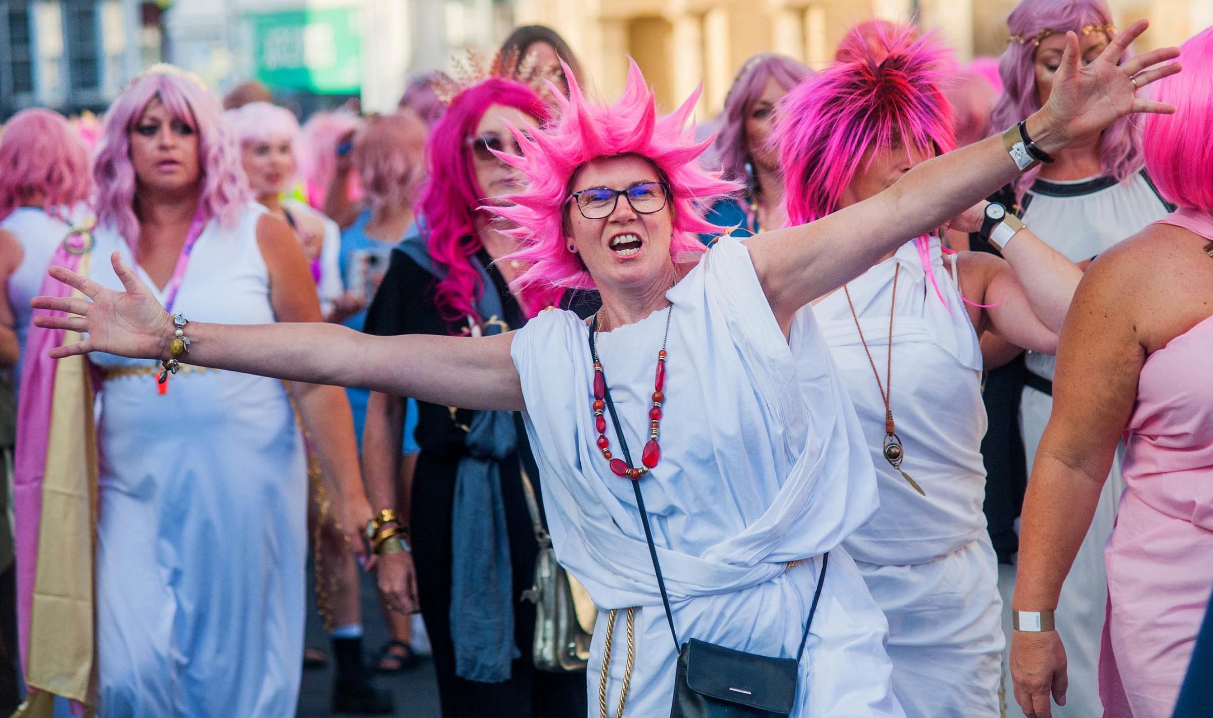 Falmouth Pink Wig Parade from the Greenbank Hotel to Church Street car park on Friday evening: Picture by Colin Higgs